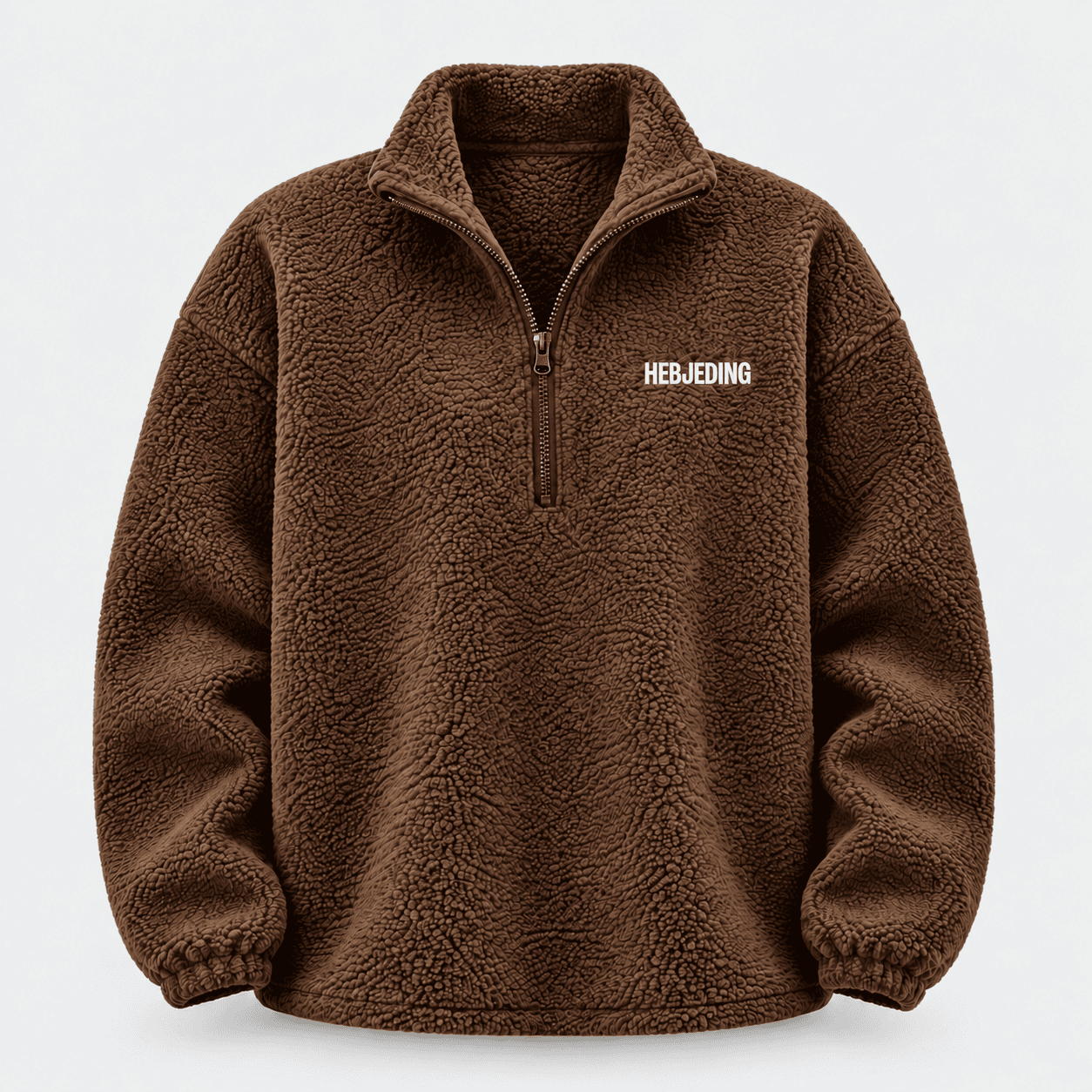 Bruine fleece met rits en witte tekst HEBJEDING op de borst